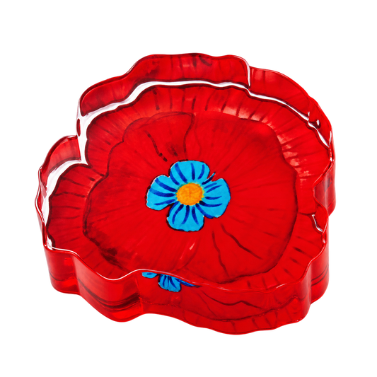 Poppy acrylic napkin weight with red floral design and blue center